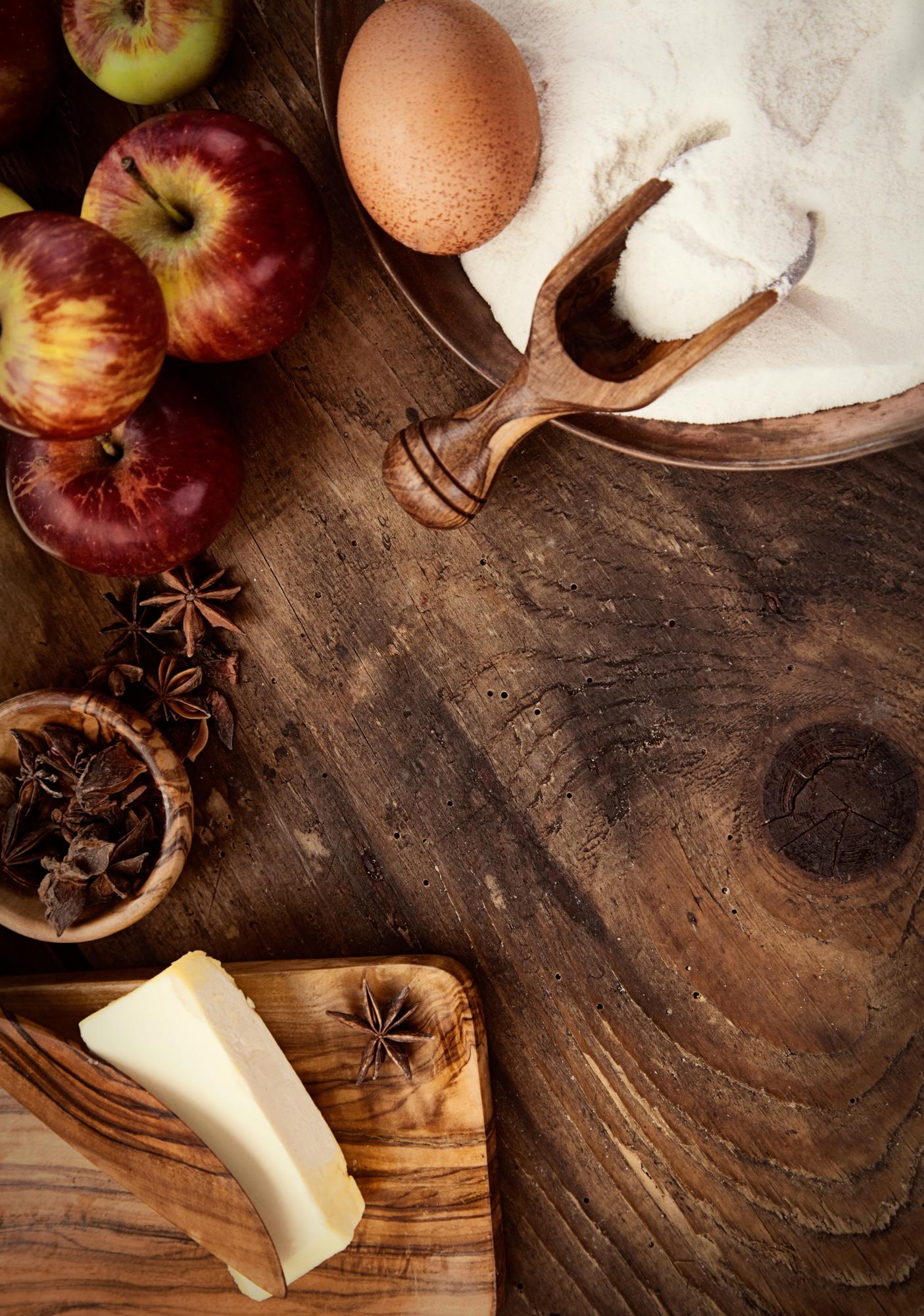 Cozy culinary studio with wooden table and ingredients